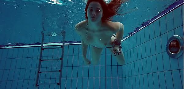 trendsBig tits teenie Liza Bubarek swimming naked in the pool